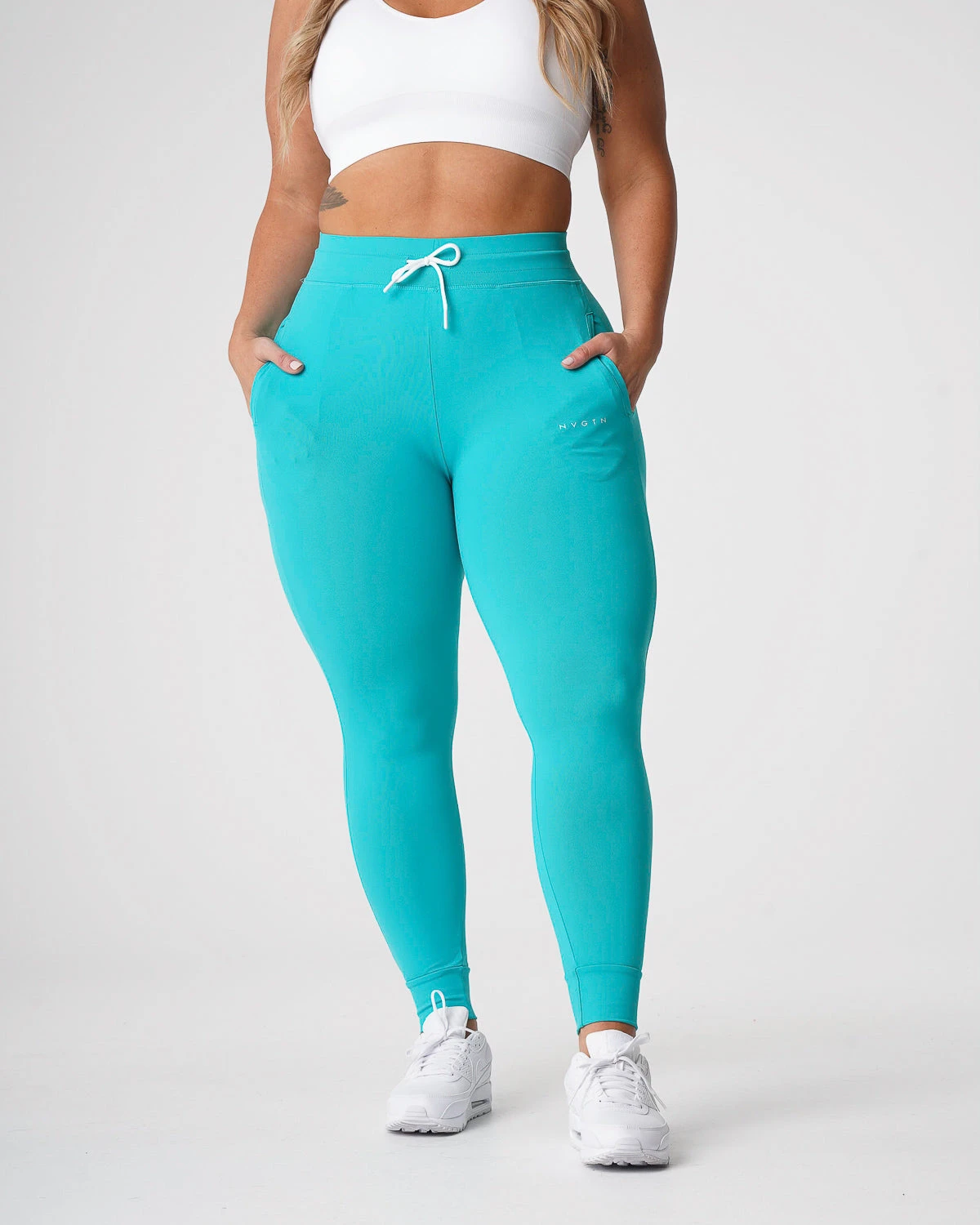 High-Waisted Turquoise Joggers with Tapered Cuffed Ankles 1 High-Waisted Turquoise Joggers with Tapered Cuffed Ankles