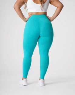 High-Waisted Turquoise Joggers with Tapered Cuffed Ankles 7 High-Waisted Turquoise Joggers with Tapered Cuffed Ankles -NVGTN Sportswear Shop DSC00396