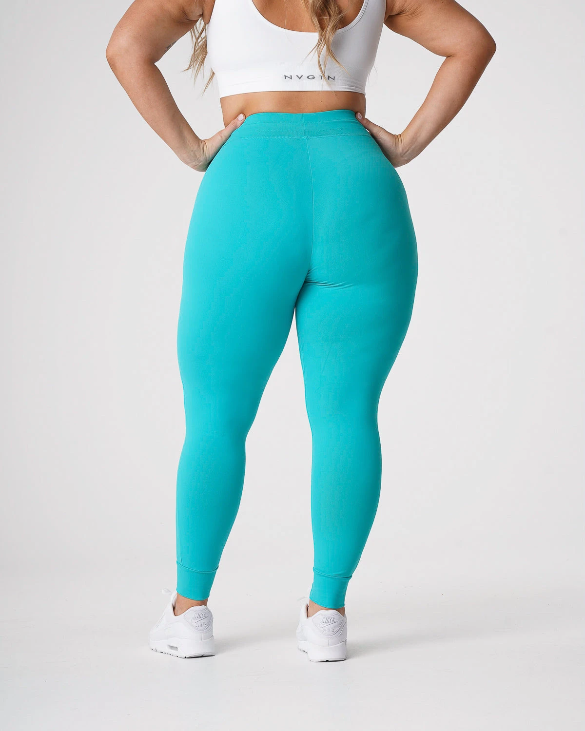 High-Waisted Turquoise Joggers with Tapered Cuffed Ankles 4 High-Waisted Turquoise Joggers with Tapered Cuffed Ankles - Image 4