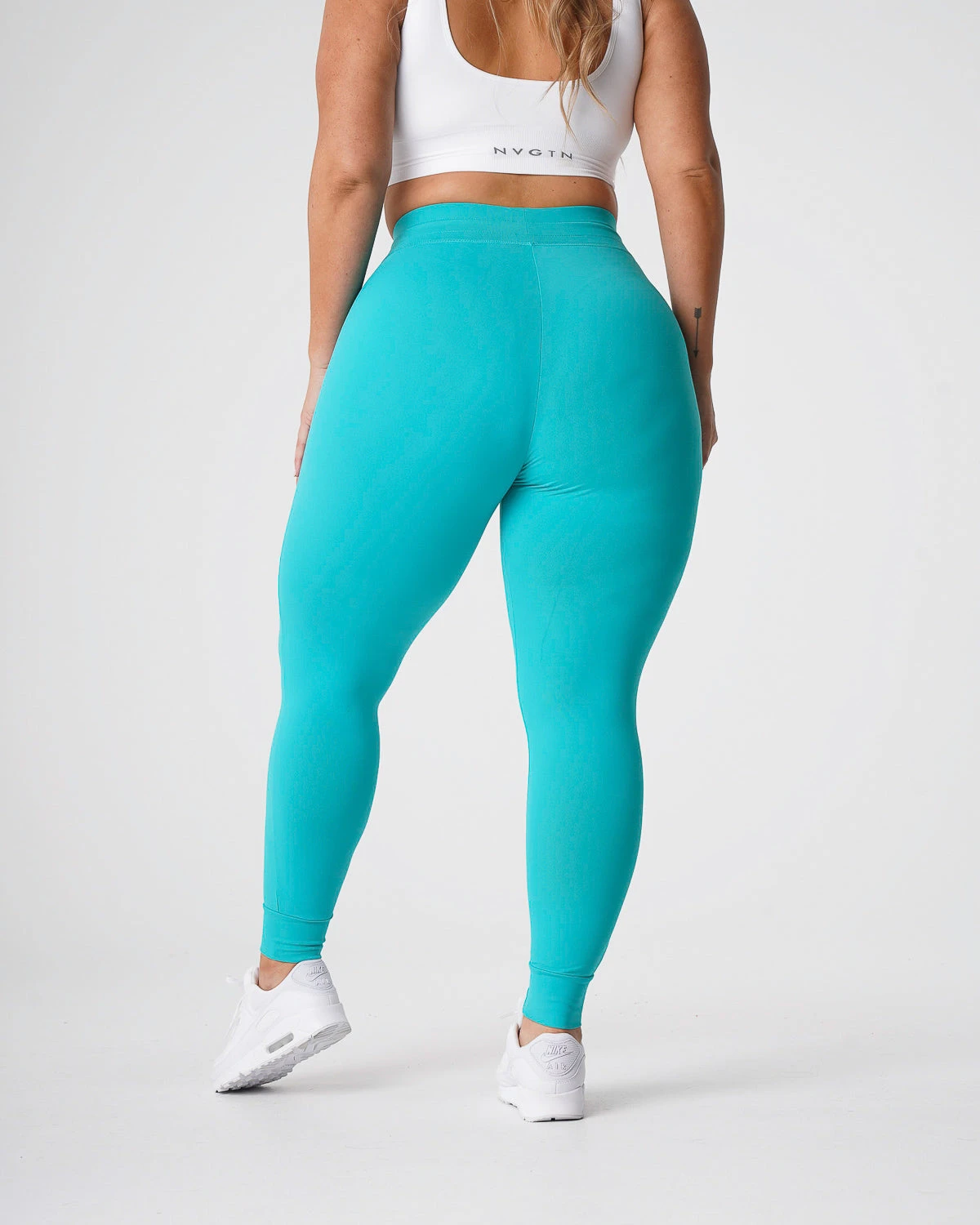 High-Waisted Turquoise Joggers with Tapered Cuffed Ankles 2 High-Waisted Turquoise Joggers with Tapered Cuffed Ankles - Image 2