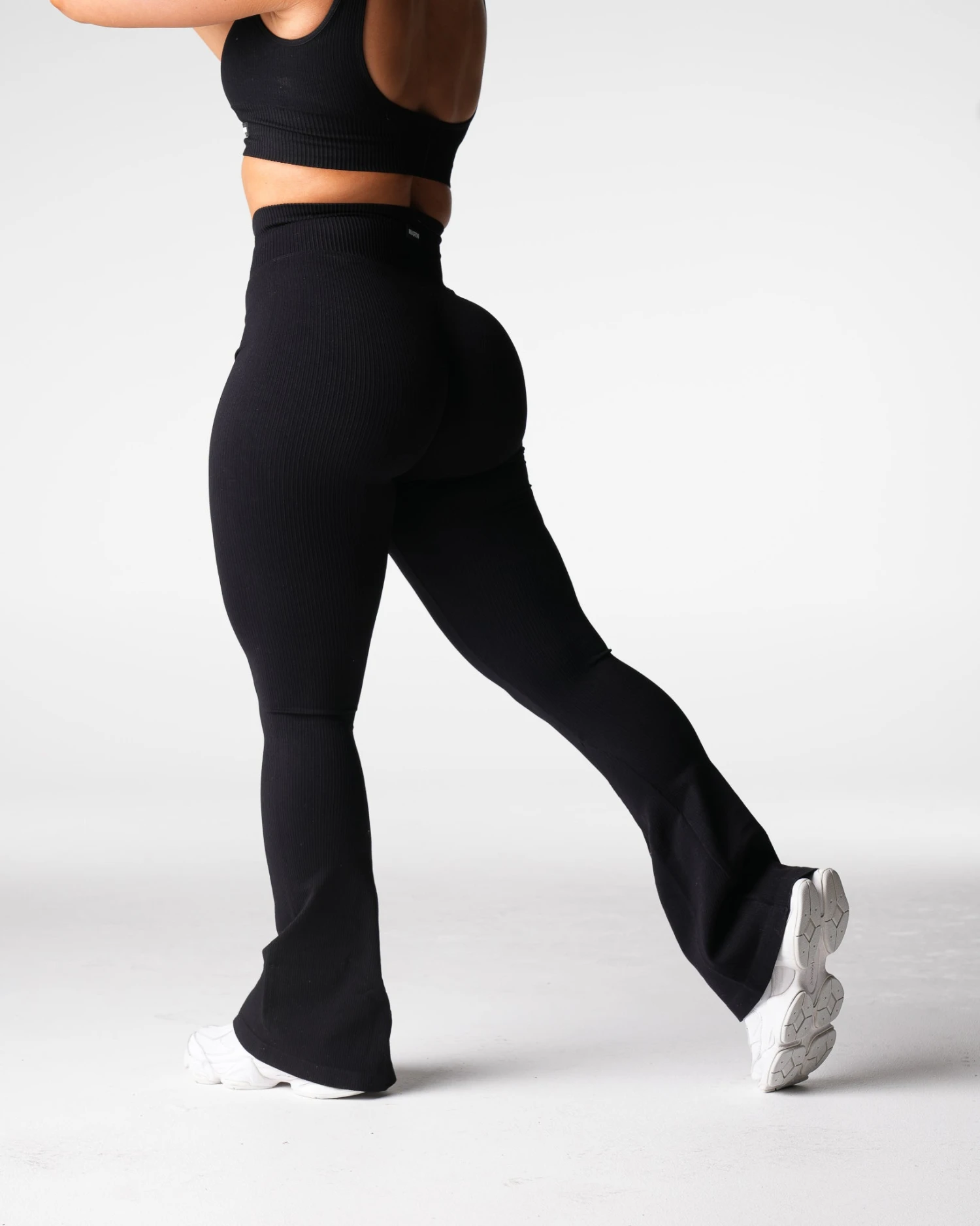 Black Ribbed Seamless Flare Leggings - High Waisted Athleisure 1 Black Ribbed Seamless Flare Leggings - High Waisted Athleisure