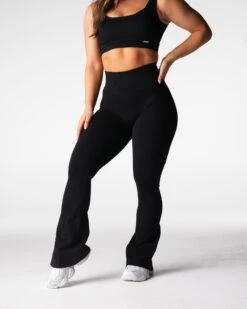 Black Ribbed Seamless Flare Leggings - High Waisted Athleisure 7 Black Ribbed Seamless Flare Leggings - High Waisted Athleisure -NVGTN Sportswear Shop DSC00680