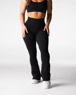 Black Ribbed Seamless Flare Leggings - High Waisted Athleisure 6 Black Ribbed Seamless Flare Leggings - High Waisted Athleisure -NVGTN Sportswear Shop DSC00681