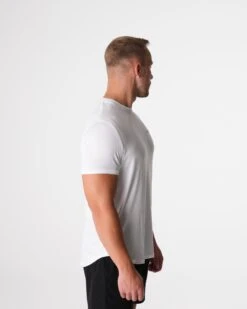 Men's White Tech Fitted Performance Tee - High-Stretch Athletic Training Shirt 7 Men's White Tech Fitted Performance Tee - High-Stretch Athletic Training Shirt -NVGTN Sportswear Shop DSC00951