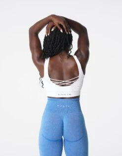 White Seamless Ribbed Sports Bra - Low Impact Criss-Cross Workout Top 7 White Seamless Ribbed Sports Bra - Low Impact Criss-Cross Workout Top -NVGTN Sportswear Shop DSC03086