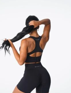 Black Ignite Seamless Sports Bra with Adjustable Band 6 Black Ignite Seamless Sports Bra with Adjustable Band -NVGTN Sportswear Shop DSC03395