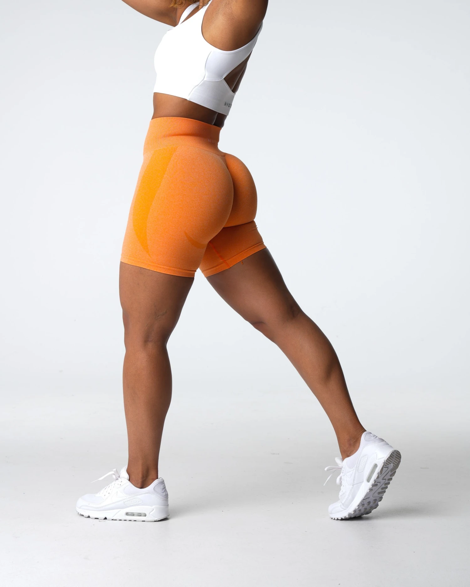 NVGTN Sunset Orange Contour Seamless Shorts 1 NVGTN Sunset Orange Contour Seamless Shorts