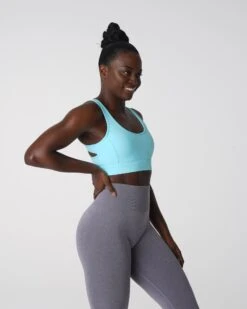 Medium Impact Criss-Cross Sports Bra - Capri Blue Allure Bra 6 Medium Impact Criss-Cross Sports Bra - Capri Blue Allure Bra -NVGTN Sportswear Shop DSC04295 1