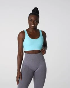 Medium Impact Criss-Cross Sports Bra - Capri Blue Allure Bra 7 Medium Impact Criss-Cross Sports Bra - Capri Blue Allure Bra -NVGTN Sportswear Shop DSC04297 1