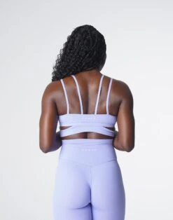 Periwinkle Ruched Crossbody Sports Bra - Revolve Activewear Top