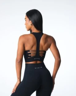High Neck Seamless Racerback Sports Bra with Breathable Cut-Out Detailing 7 High Neck Seamless Racerback Sports Bra with Breathable Cut-Out Detailing -NVGTN Sportswear Shop DSC07128