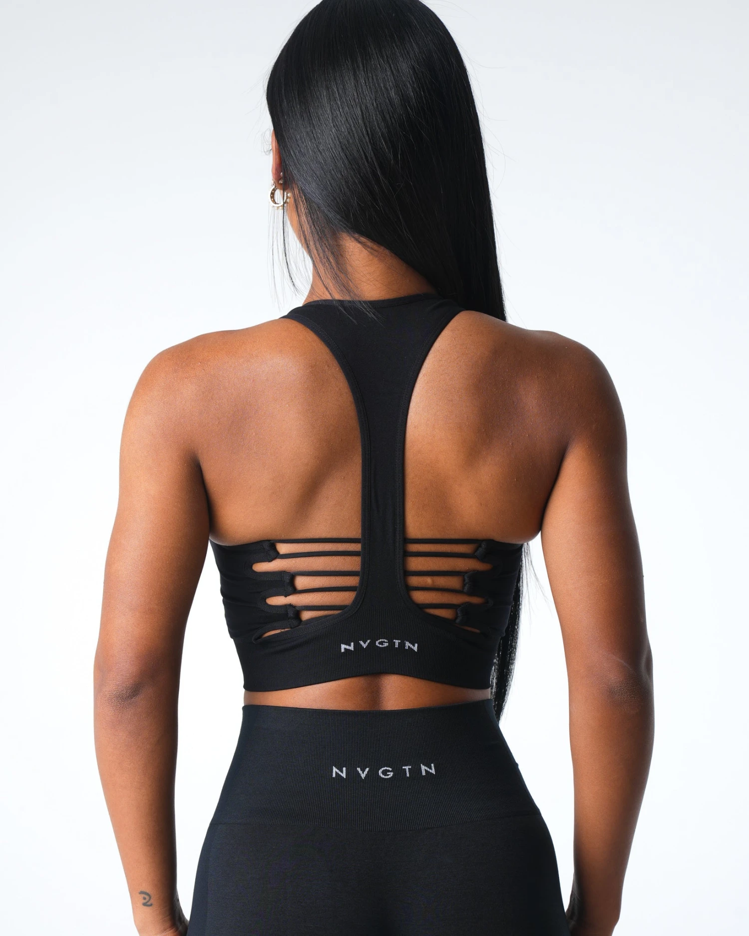High Neck Seamless Racerback Sports Bra with Breathable Cut-Out Detailing 1 High Neck Seamless Racerback Sports Bra with Breathable Cut-Out Detailing