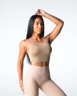 Beige Resilience Seamless Sports Bra - High Neck Racerback Workout Top 6 Beige Resilience Seamless Sports Bra - High Neck Racerback Workout Top -NVGTN Sportswear Shop DSC07848
