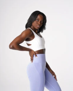 Allure White Sports Bra with Adjustable Support & Criss-Cross Back 6 Allure White Sports Bra with Adjustable Support & Criss-Cross Back -NVGTN Sportswear Shop DSC08417