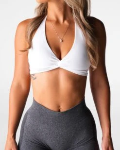 White Seamless Halter Sports Bra with Twist Front 6 White Seamless Halter Sports Bra with Twist Front -NVGTN Sportswear Shop DSC09060