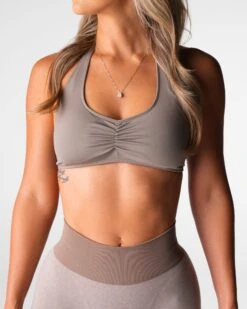 Seamless Halter Sports Bra with Open Back & Front Scrunch - Taupe 6 Seamless Halter Sports Bra with Open Back & Front Scrunch - Taupe -NVGTN Sportswear Shop DSC09099